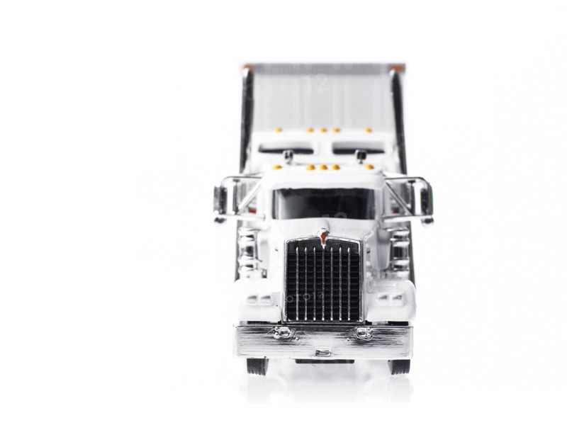 Studio shot of white toy truck. Photo : David Arky