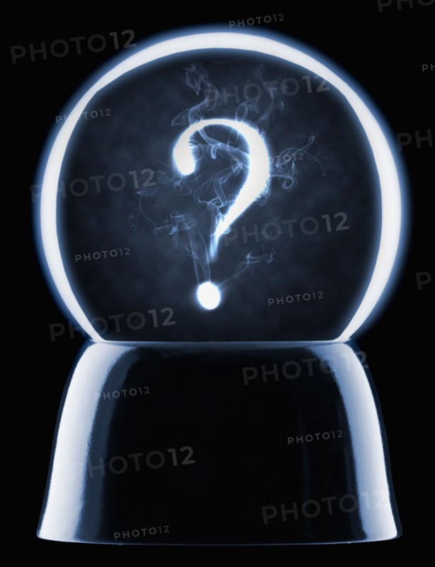 Studio shot of crystal ball showing question mark. Photo : Mike Kemp