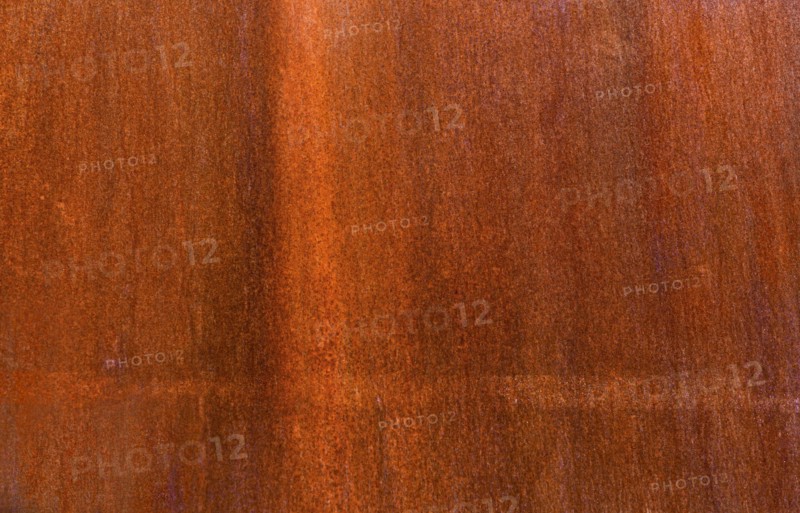Close-up of brown wooden surface.