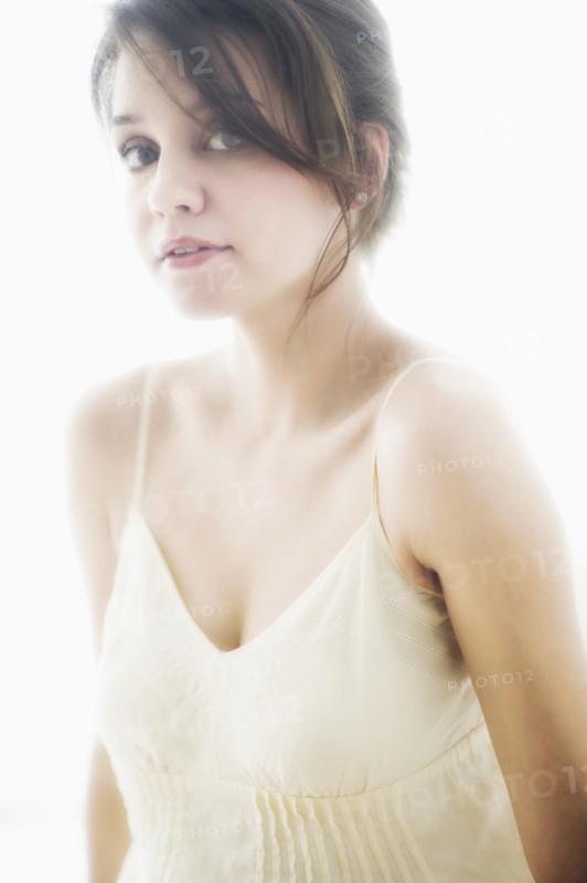 Studio portrait of young woman.
