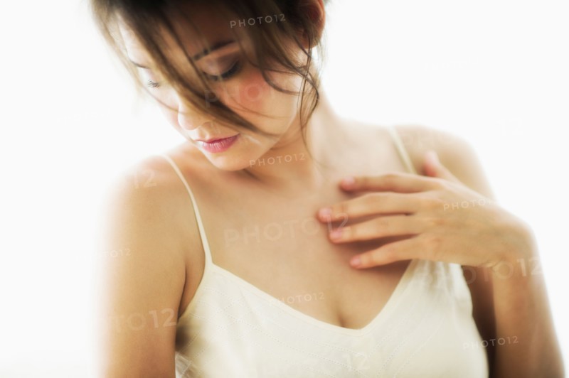 Studio portrait of young woman.