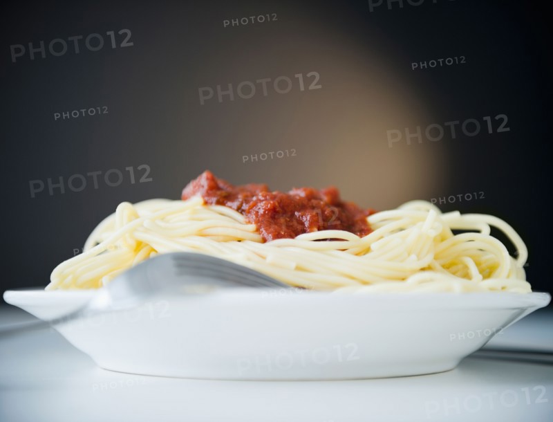Spaghetti with tomato sauce, studio shot. Photo : Jamie Grill Photography