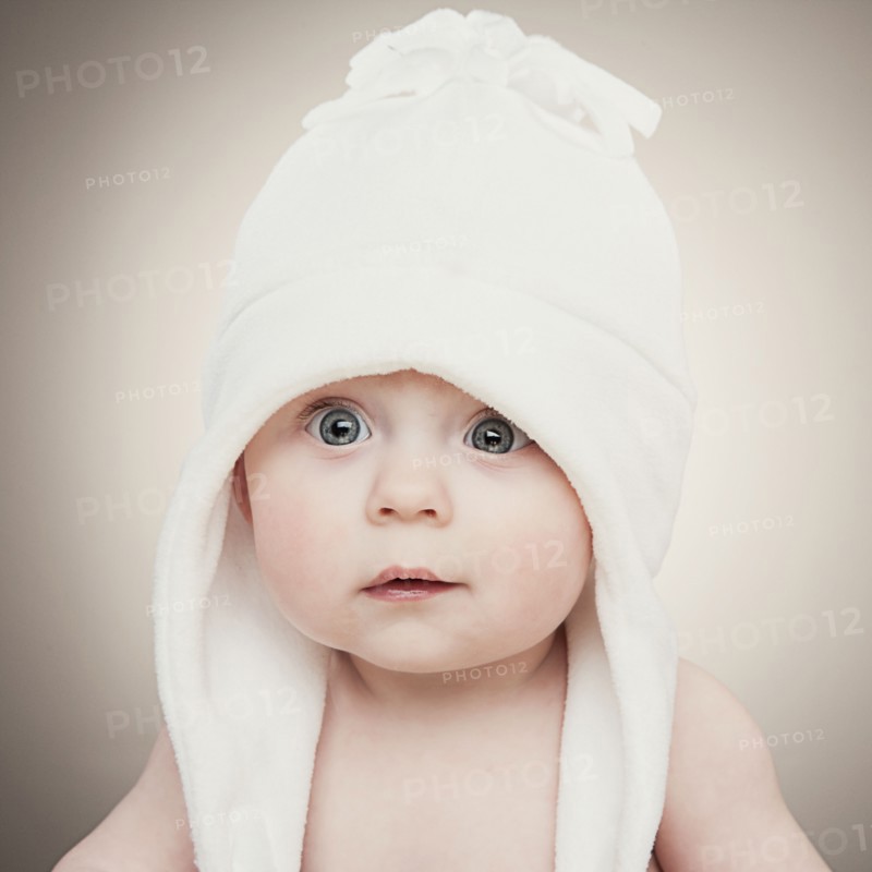 Surprised baby boy (6-11 months) . Photo : King Lawrence