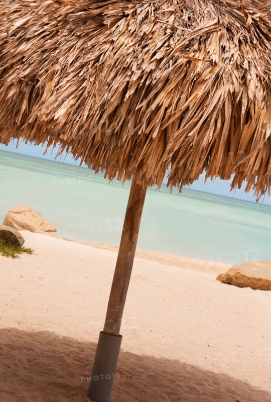 Aruba, palapa on beach. Photo : Daniel Grill