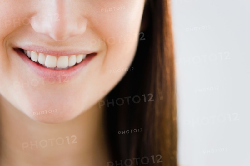 Close up of young woman's mouth. Photo : Jamie Grill Photography