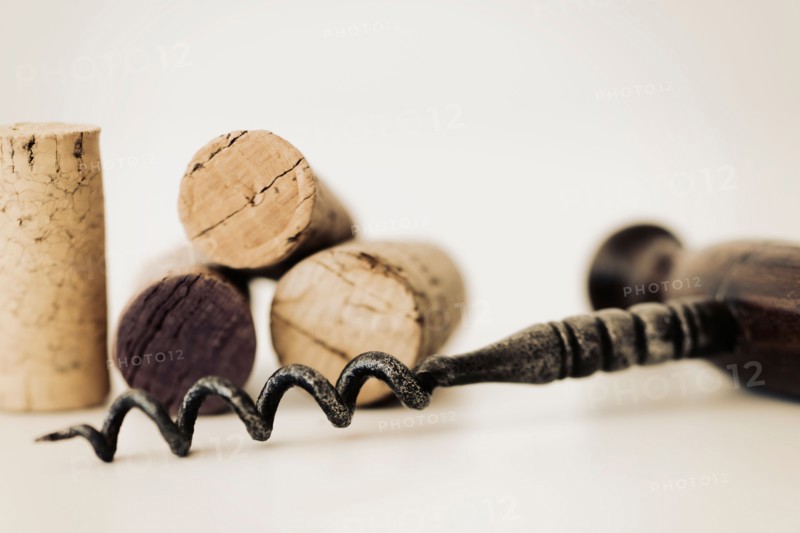 Wine corks with corkscrew.
