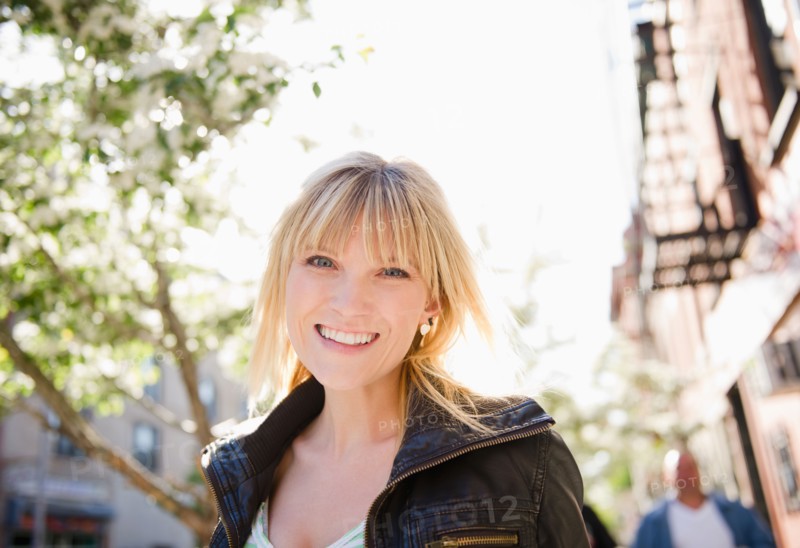 USA, New York, Williamsburg, Brooklyn, Portrait of smiling woman. Photo: Jamie Grill