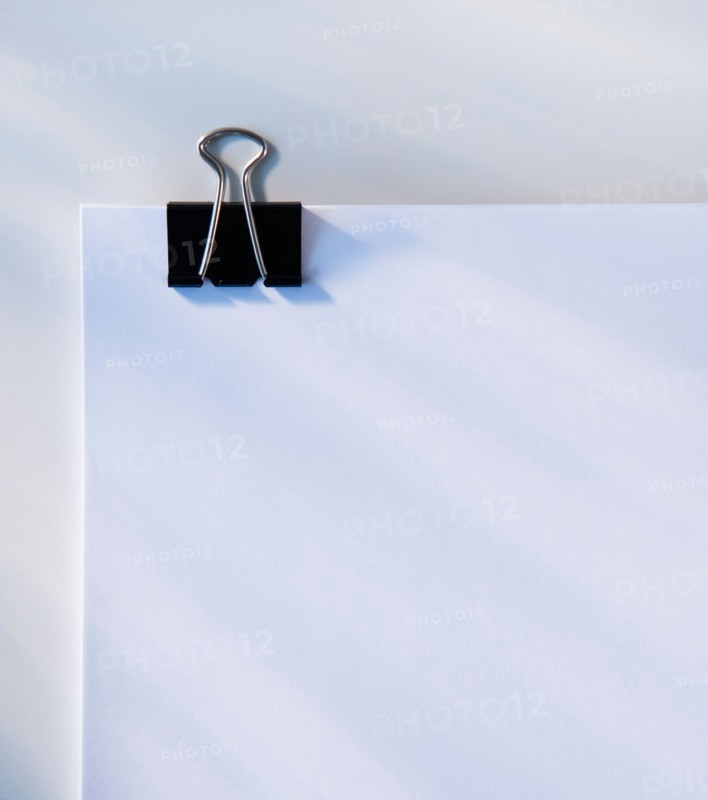 Paper with clip, studio shot. Photo: Daniel Grill