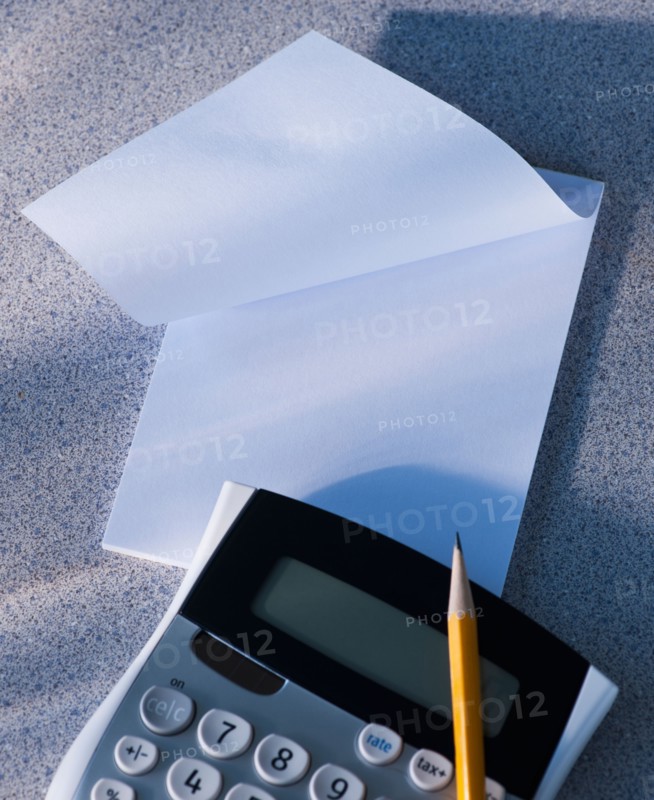 Calculator and blank paper. Photo : Daniel Grill