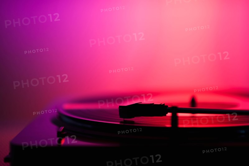 Close up of turntable on pink background. Photo : Daniel Grill