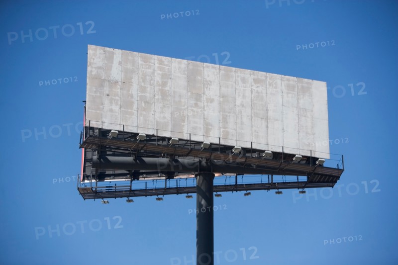 Empty billboard against clear sky. Photo: fotog