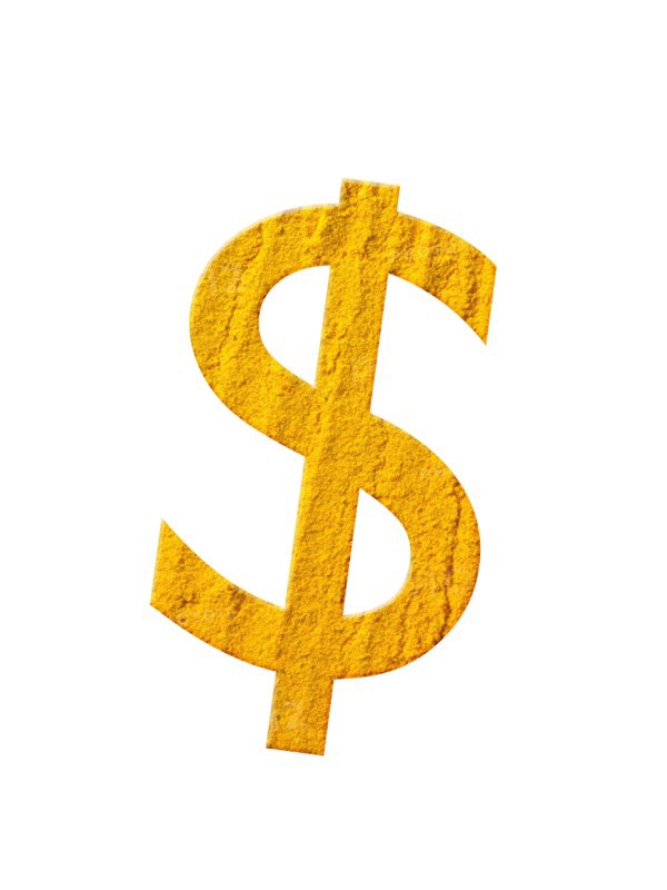 Studio shot of Chili Powder making US Dollar Sign on white background. Photo: David Arky