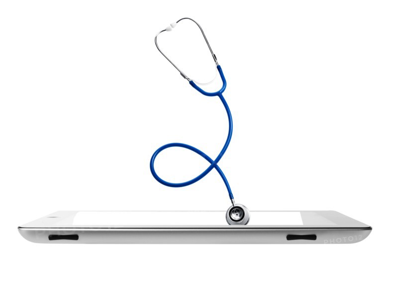 Studio shot of stethoscope coming out from digital tablet. Photo: David Arky