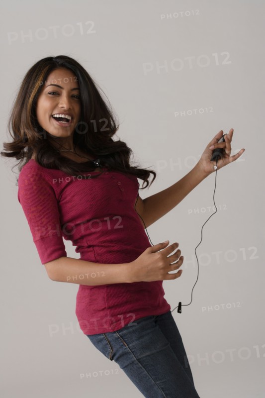 Portrait of young woman, studio shot. Photo: Rob Lewine