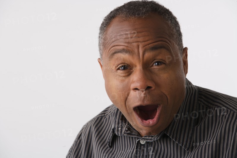 Portrait of mature man, studio shot. Photo: Rob Lewine