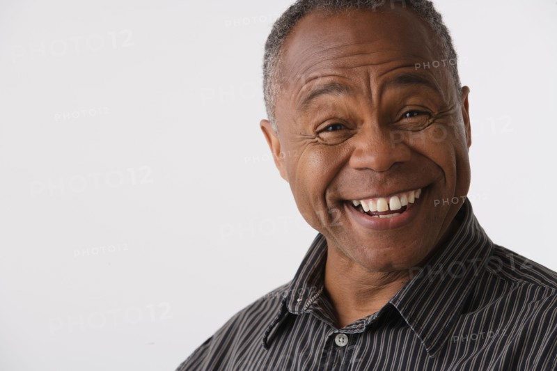 Portrait of mature man, studio shot. Photo : Rob Lewine