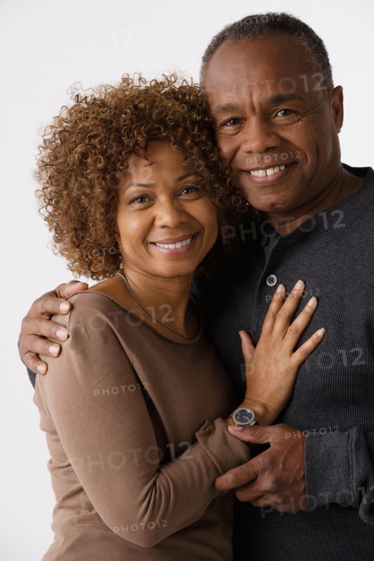 Portrait of mature couple, studio shot. Photo : Rob Lewine