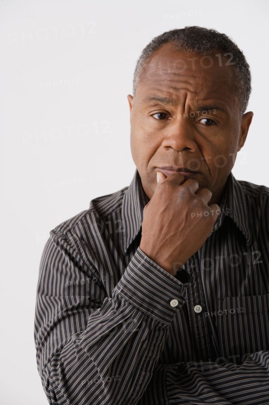Portrait of mature man, studio shot. Photo: Rob Lewine