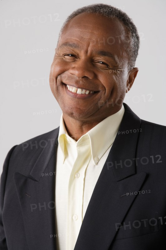 Portrait of mature businessman, studio shot. Photo : Rob Lewine