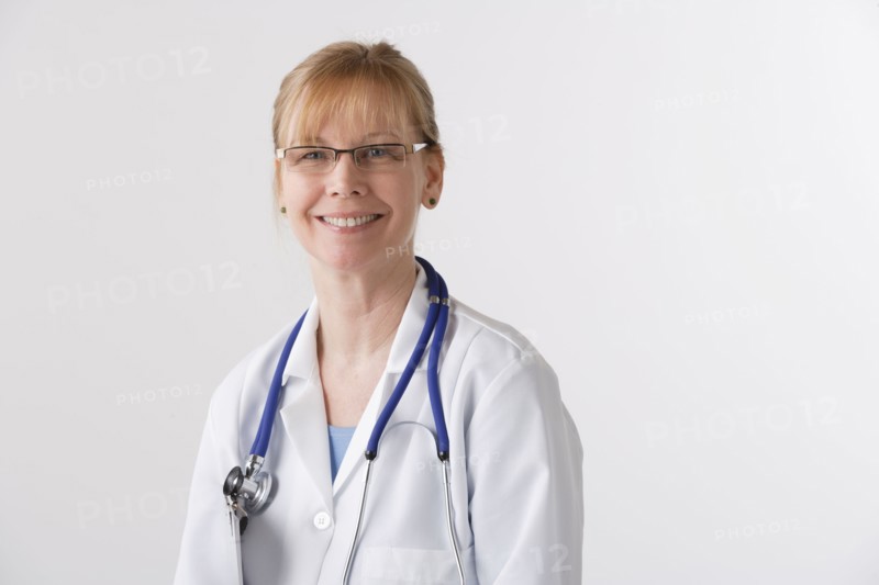 Portrait of female doctor, studio shot. Photo : Rob Lewine