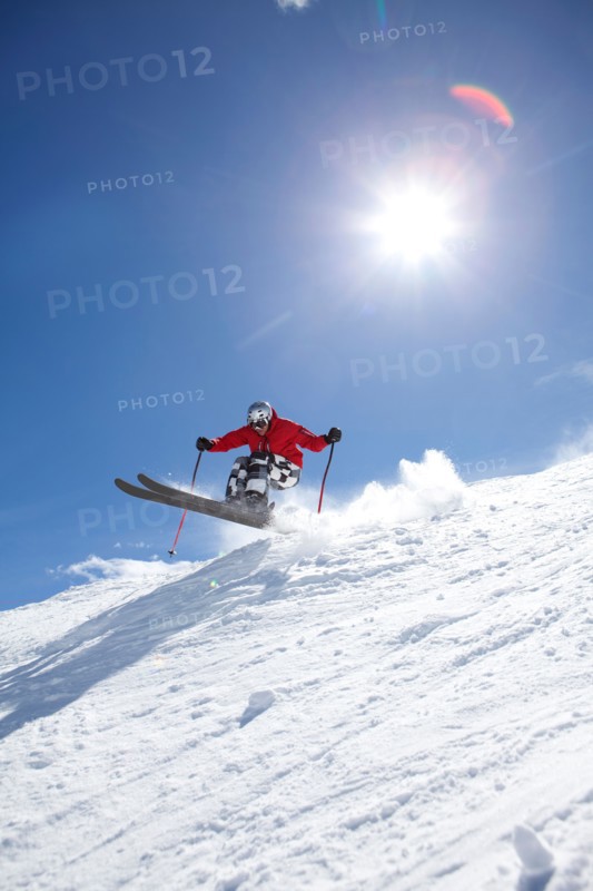 Male skier on fresh powder snow