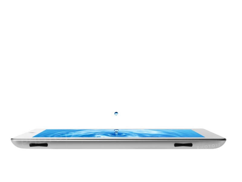 Studio shot of water splashing on digital tablet. Photo: David Arky