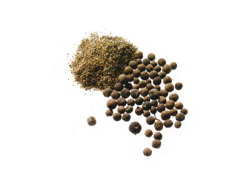 Studio shot of Nutmeg Powder and Whole Nutmeg on white background. Photo : David Arky