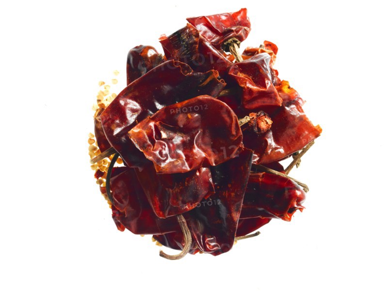 Studio shot of Chili Peppers on white background. Photo : David Arky