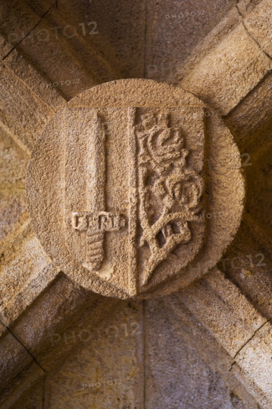 Greece, Rhodes, Stone shield on medieval fortified wall.
