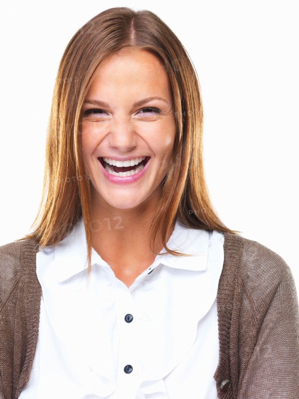Studio portrait of beautiful business woman laughing. Photo: momentimages
