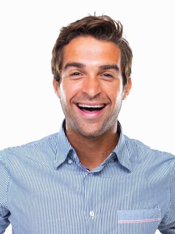 Studio portrait of cheerful business man smiling. Photo : momentimages