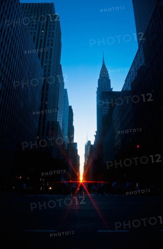 USA, New York, New York City, Chrysler Building and street at sunset.