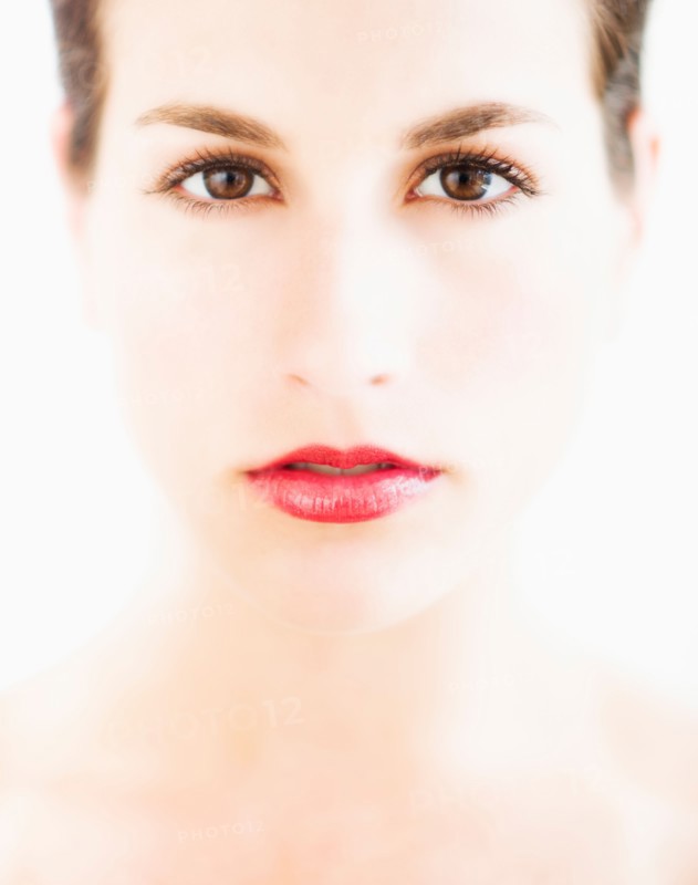 Studio portrait of young woman.
