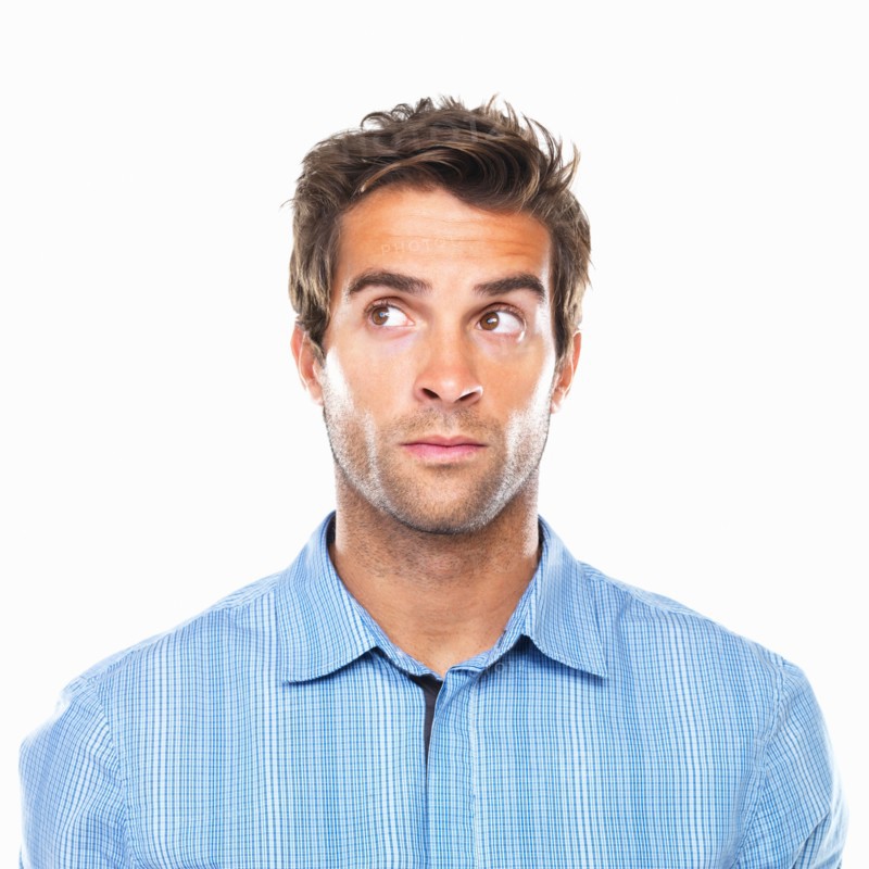 Close-up of business man looking away. Photo : momentimages