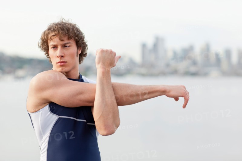 USA, Washington State, Seattle, Young athlete doing workout. Photo : Take A Pix Media