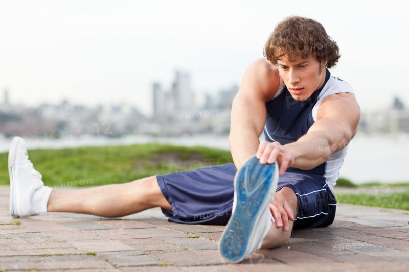 USA, Washington State, Seattle, Young athlete doing workout. Photo : Take A Pix Media