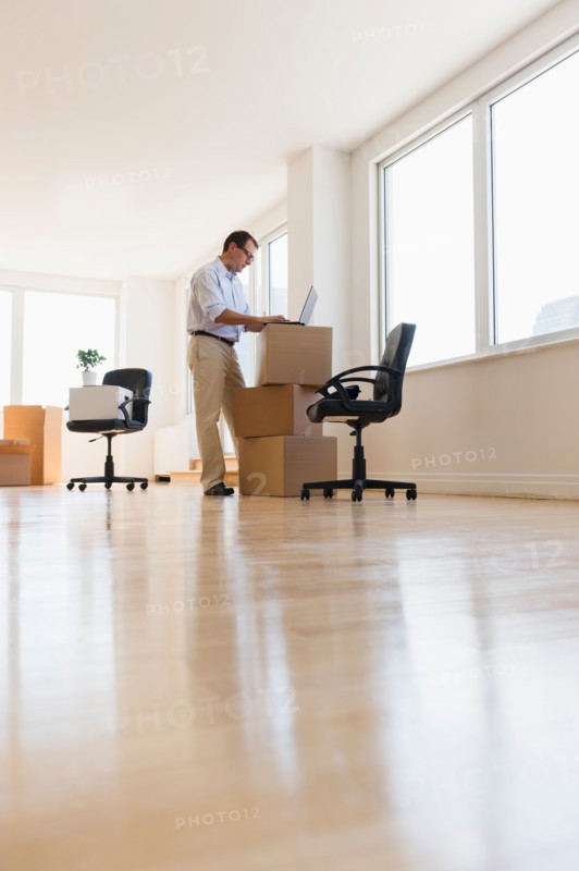 Businessman setting up office.