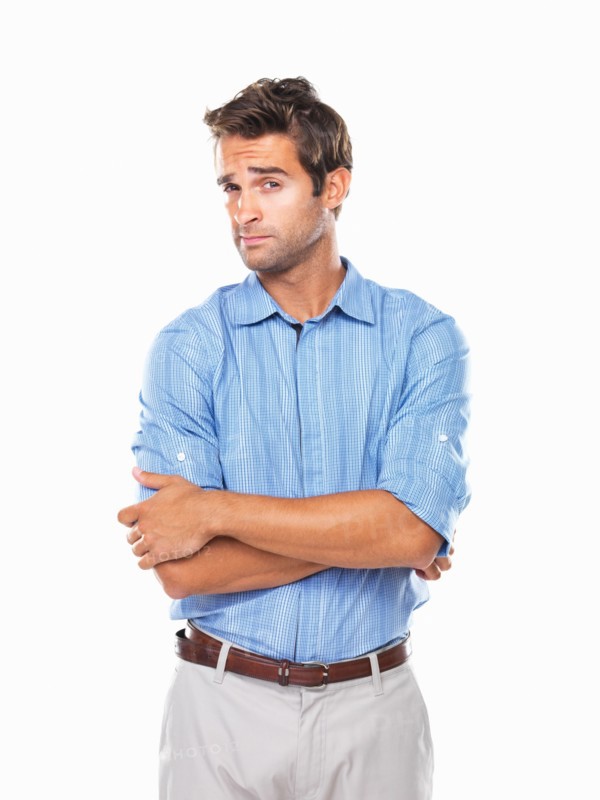 Studio portrait of young business man looking askance. Photo: momentimages