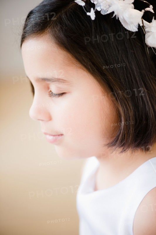 Portrait of girl's (8-9) celebrating Fist Communion. Photo: Jamie Grill