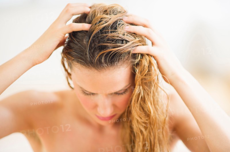 Woman washing hair.