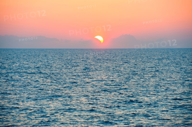 Aegean Sea horizon at sunset.