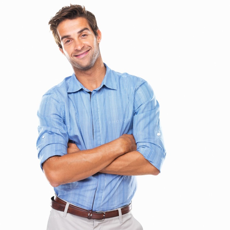 Portrait of young business man standing with hands folded and smiling. Photo : momentimages