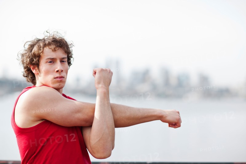 USA, Washington State, Seattle, Young athlete doing workout. Photo : Take A Pix Media