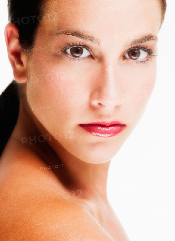 Studio portrait of young woman.