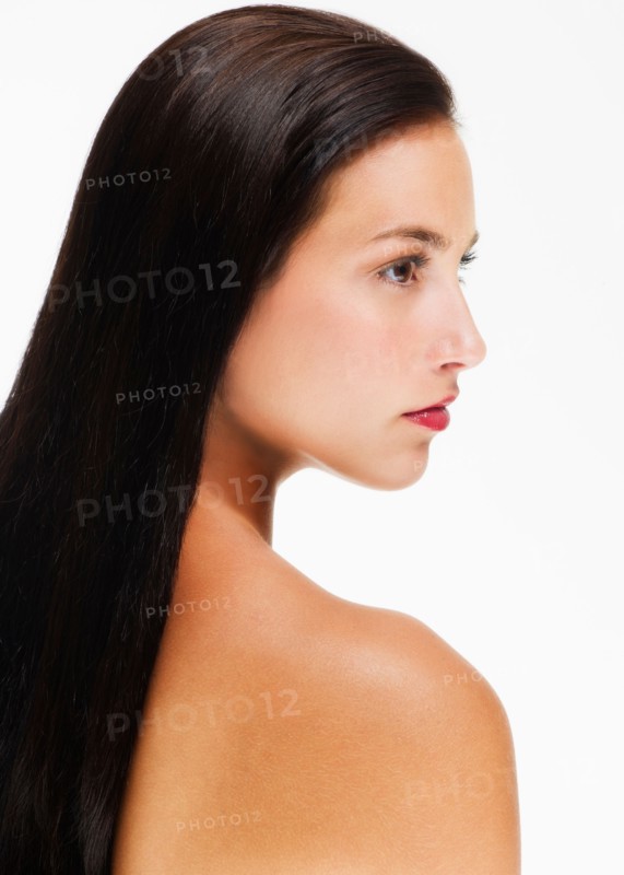 Studio portrait of young woman.