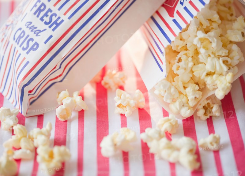 Close up of popcorn and paper bags. Photo : Jamie Grill