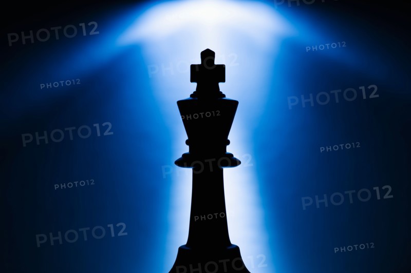 Illuminated king chess piece.