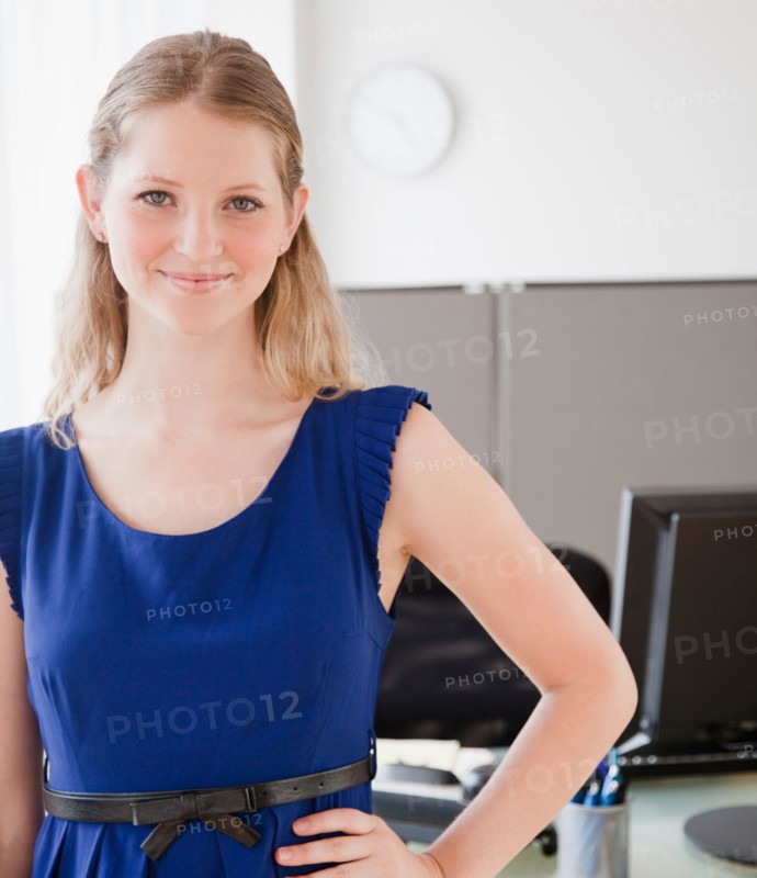 Portrait of young woman in office. Photo: Jamie Grill