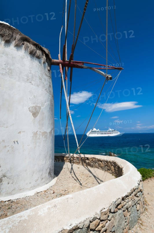 Greece, Cyclades Islands, Mykonos, Old windmill at coast.