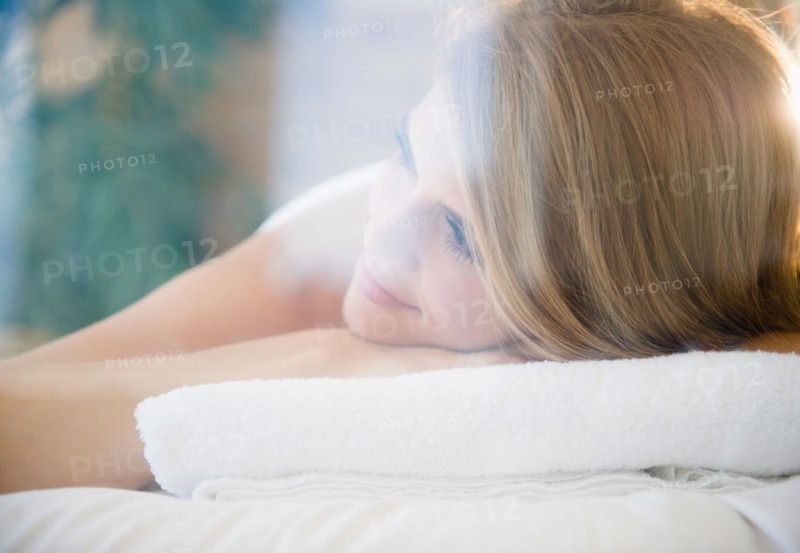 Woman relaxing in spa. Photo : Jamie Grill